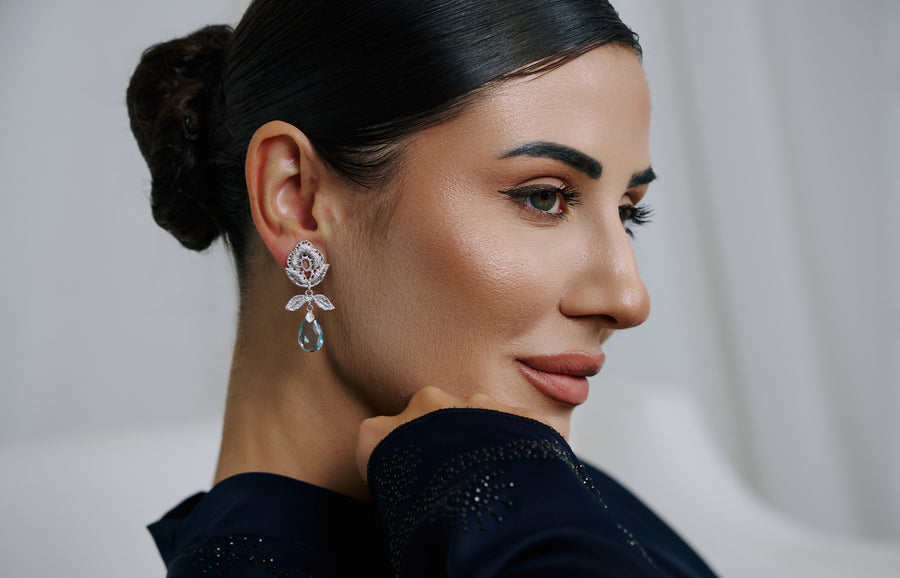 Azure earrings on a display