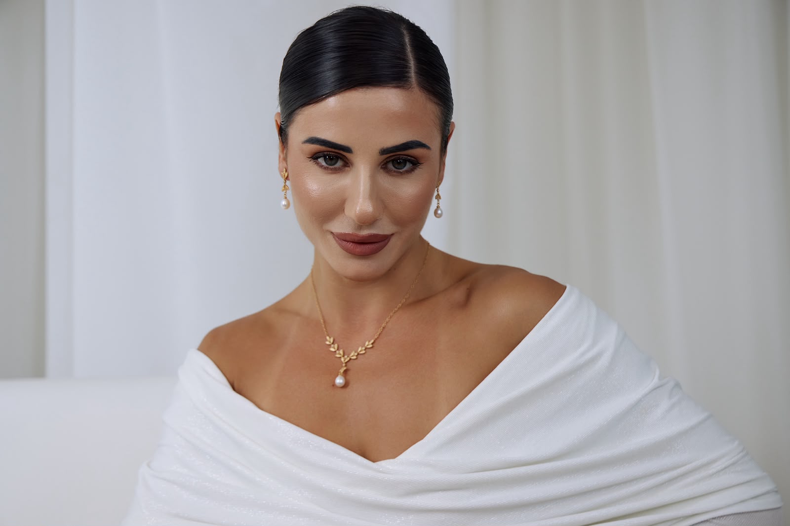 Necklace and earring styled look